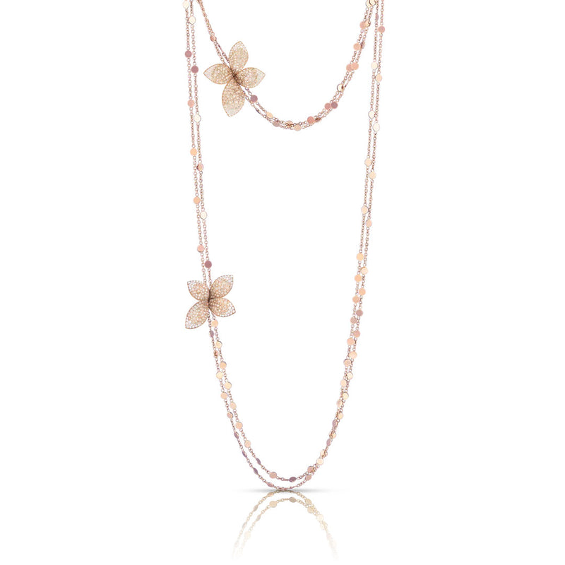 Collana lunga in Oro rosa 18kt con due fiori tempestati di diamanti bianchi e diamanti champagne.